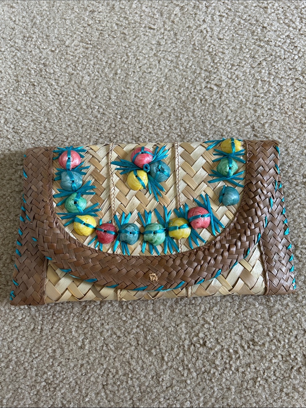 Handwoven Straw Clutch with Multicolor Shell Trim